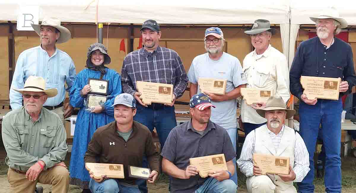 The top 10 shooters with Dave Gullo, overall winner, standing at the left.